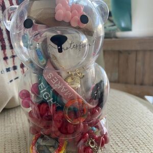 Mystery jewelry jar. It’s a gummy bear filled with fun and super cute pieces!